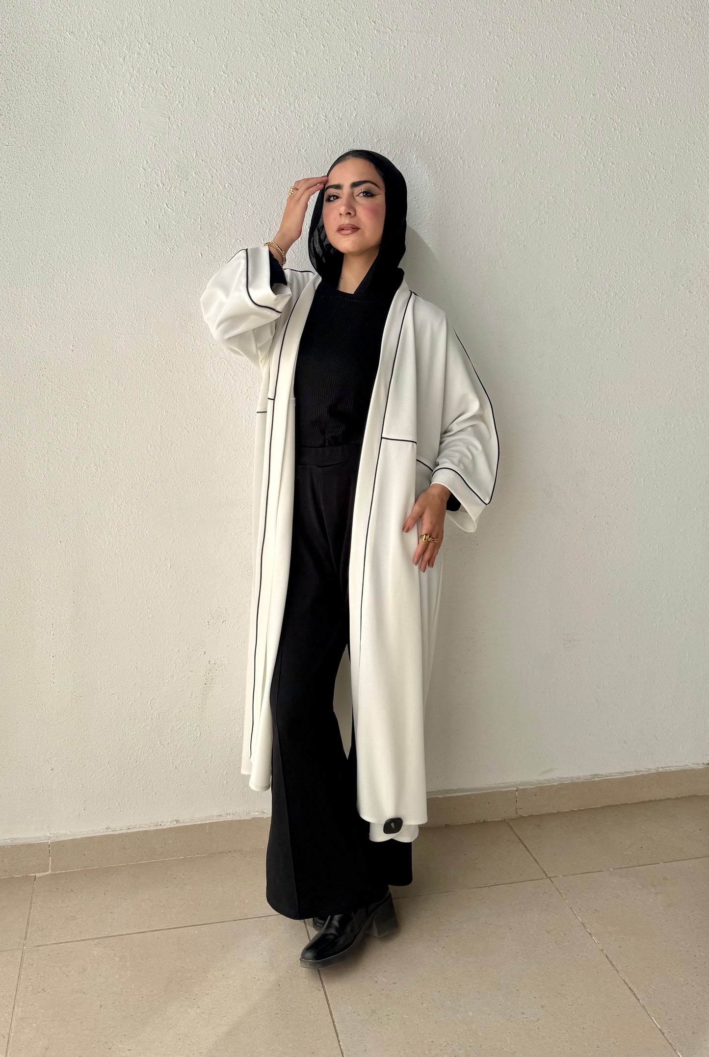 Long cardigan with decorative tape
