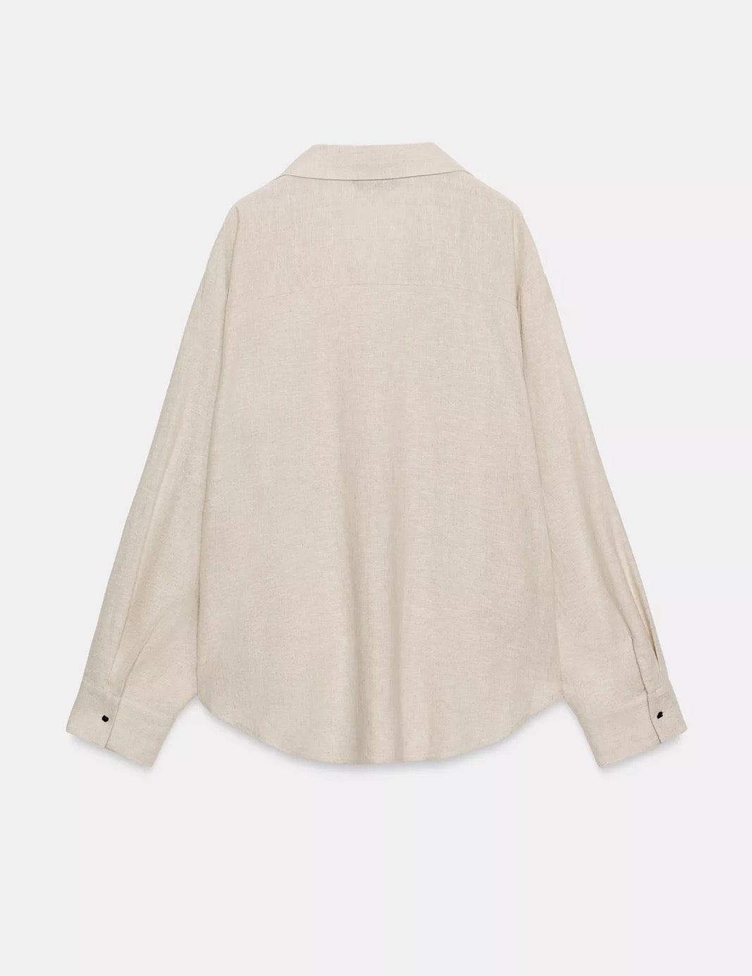 Linen blouse with pleated hemline