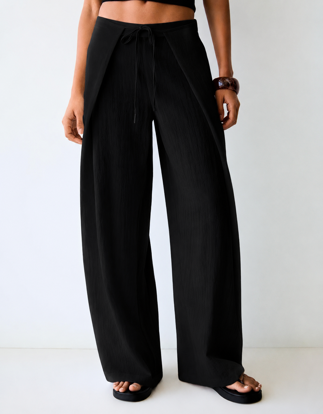 Pant with tied pleat