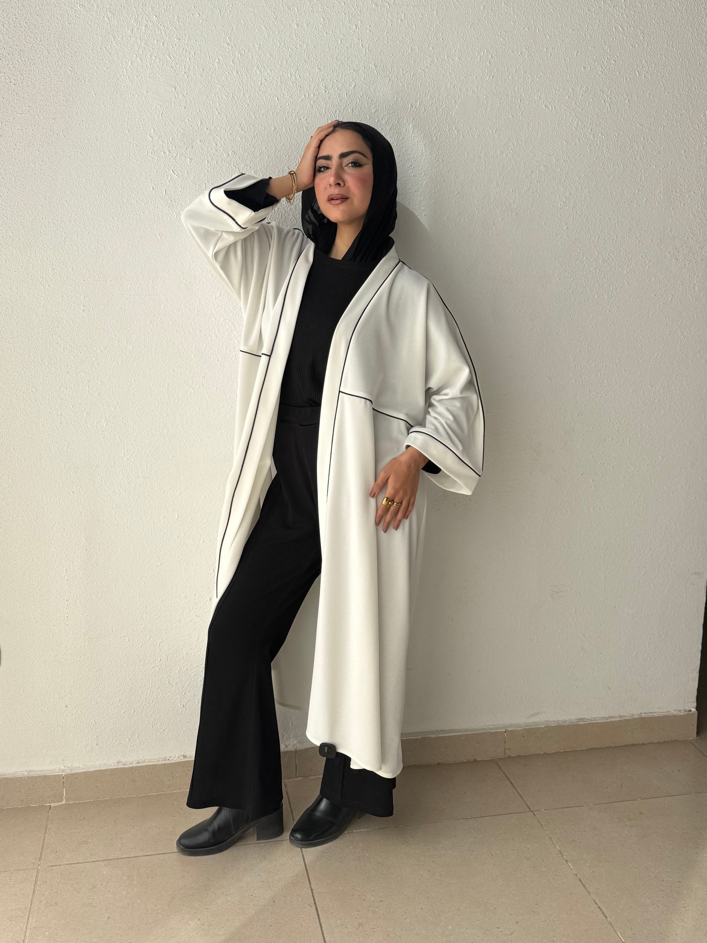 Long cardigan with decorative tape