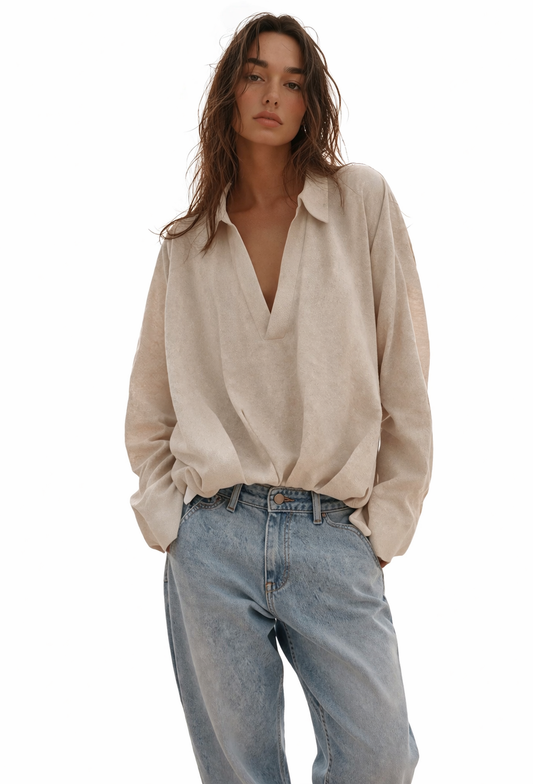 Linen blouse with pleated hemline
